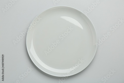 Beautiful ceramic plate on light background, top view