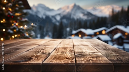 An empty wooden table with a blurred winter scene