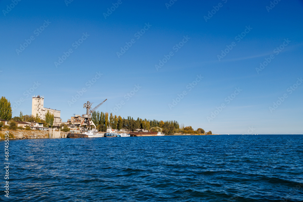 old abandoned soviet Port Balykchy on Issyk-Kul lake at sunny autumn afternoon.