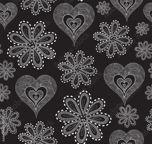 Beautiful decorative vector seamless pattern with hand drawn flowers and figured hearts