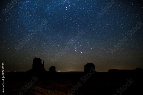 constellation orion rising above Monument Valley, West Mitten Butte, East Mitten Butte and Merrick Butte, Arizona, Utah, USA, travel usa and north america photo