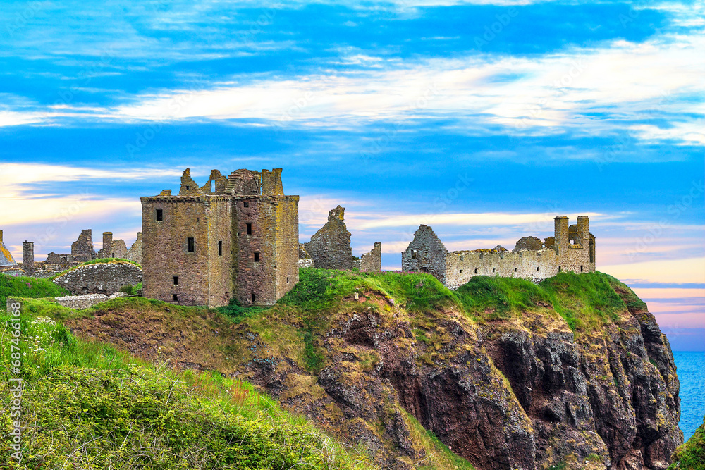 Dunnottar Castle is a ruined medieval fortress located upon a rocky headland on the north-eastern coast of Scotland.