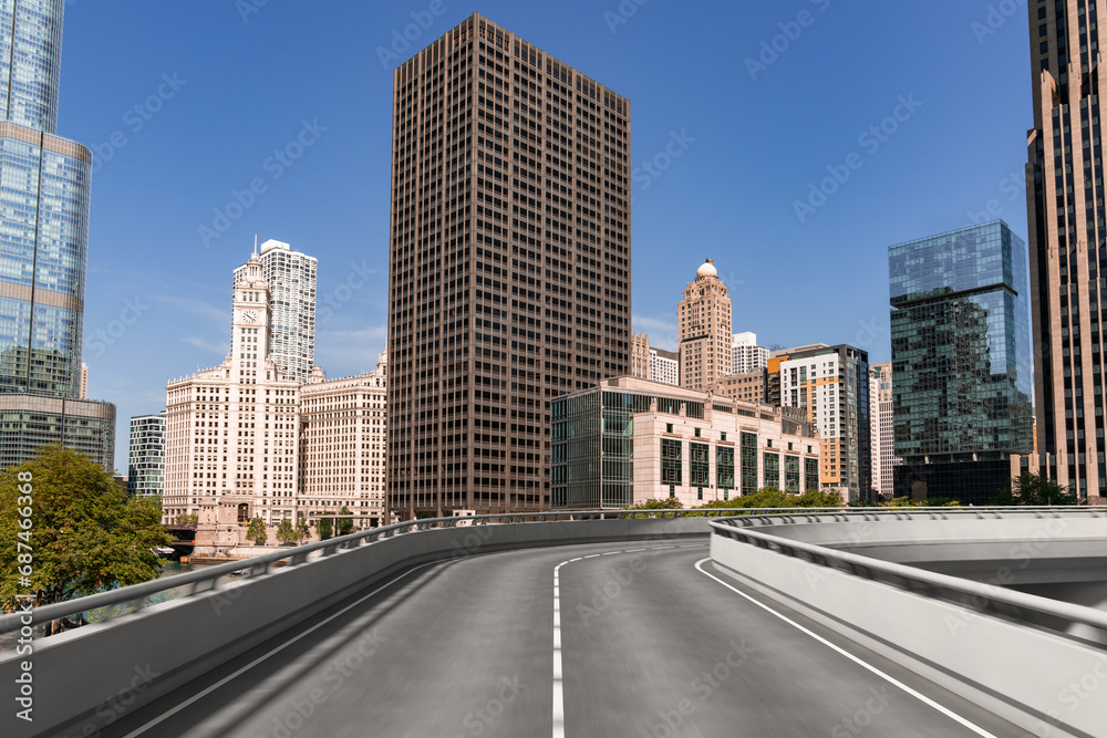 Fototapeta premium Empty urban asphalt road exterior with city buildings background. New modern highway concrete construction. Concept of way to success. Transportation logistic industry fast delivery. Chicago. USA.