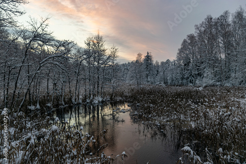 river in winter, sunset sky, beautiful winter landscape, blue hour, dusk