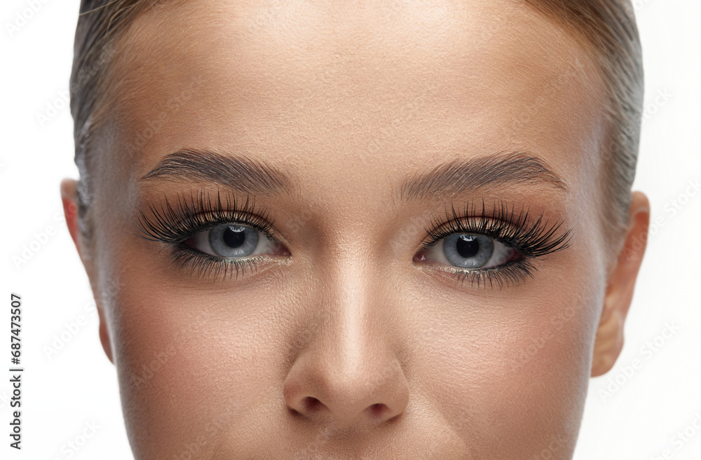 Female Eye with Extreme Long False Eyelashes. Eyelash Extensions. Makeup, Cosmetics, Beauty. Close up, Macro Female Eye with Extreme Long False Eyelashes. Eyelash Extensions. Makeup, Cosmetics, Beauty. Close up, Macro