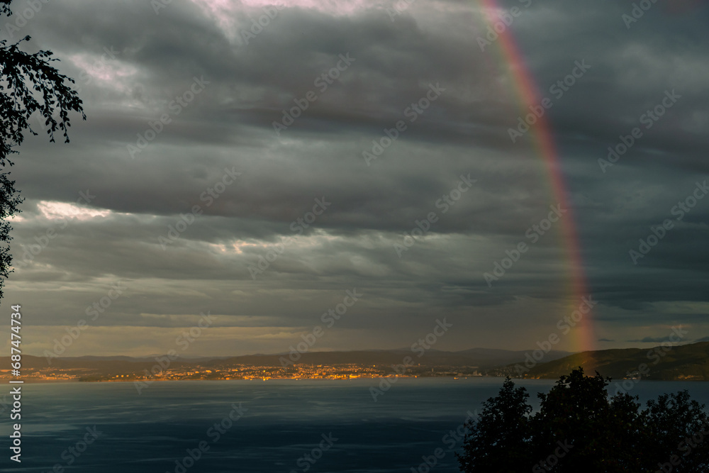 Spectacular Rainbow Embracing Trondheim's Fjord