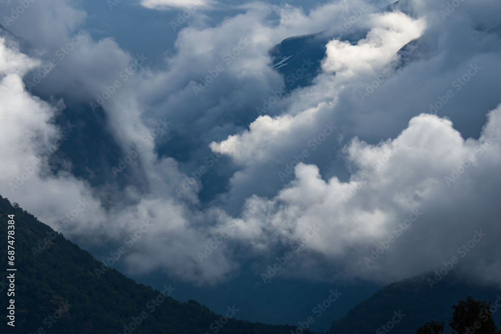 Clouds rolling in above fhord in Norway during summer Clouds rolling in above fhord in Norway during summer
