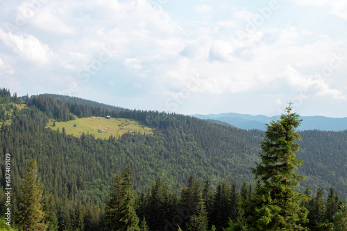 Summer landscape in mountains a sunny day. Fantastic mountain landscape © Oksana