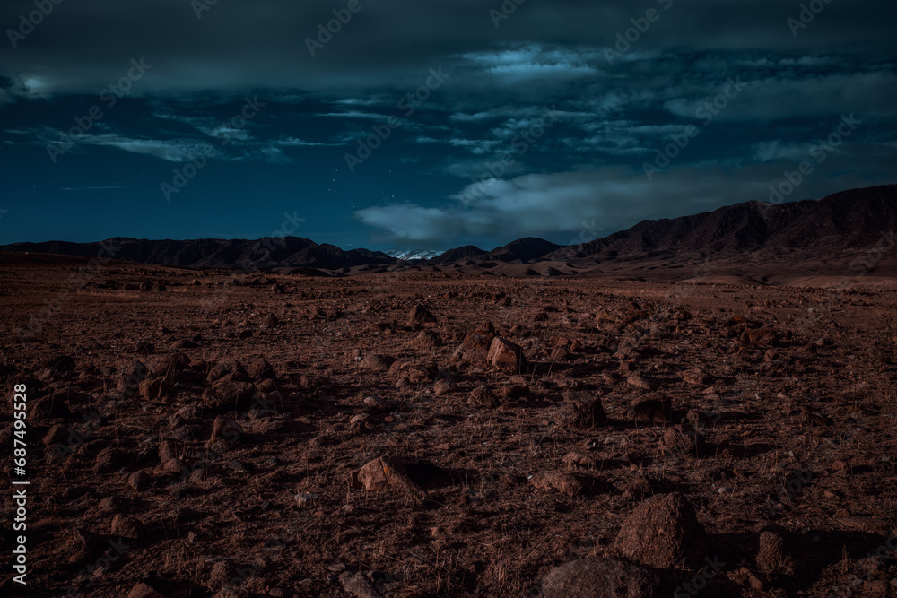 Landscape of rocky mountainous terrain at twilight