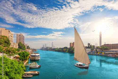 Traditional felucca board in the Nile, centre of Cairo, Egypt
