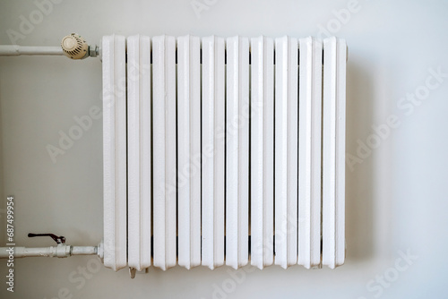 Wallpaper Mural Heating radiator in the interior of an apartment or house during the cold winter heating period Torontodigital.ca