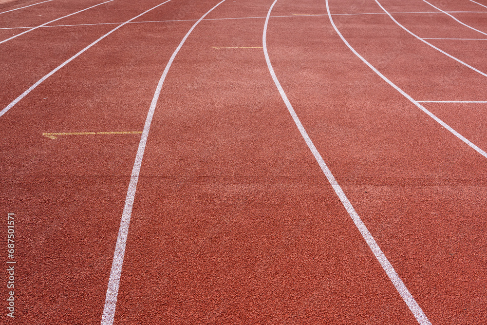 running track with lane numbers on the outdoor athletic stadium. 