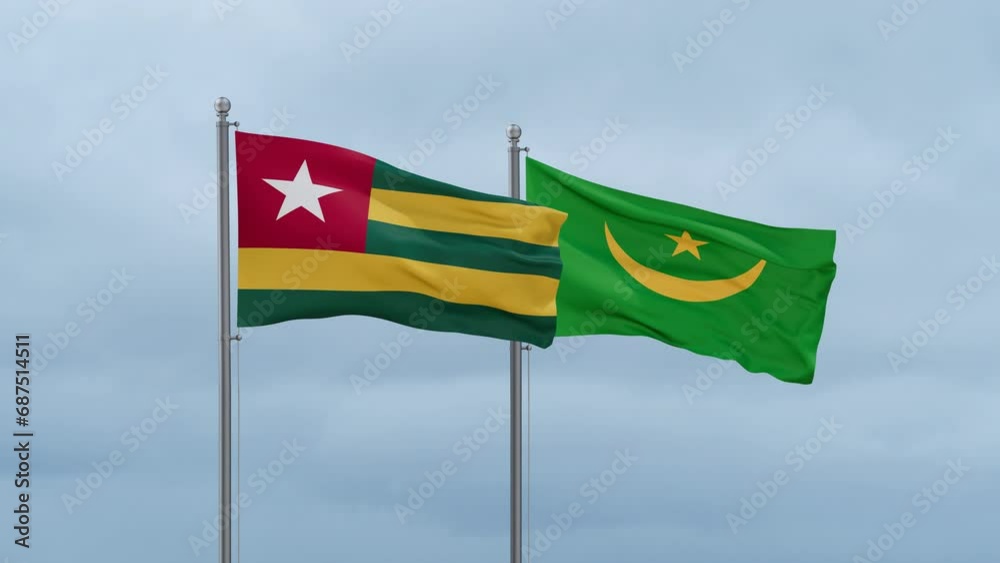 Mauritania flag and Togo flag waving together on cloudy sky, endless seamless loop, two country relations concept Mauritania flag and Togo flag waving together on cloudy sky, endless seamless loop, two country relations concept