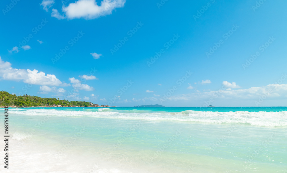 Turquoise water and white sand in world famous Anse Lazio beach in Praslin island