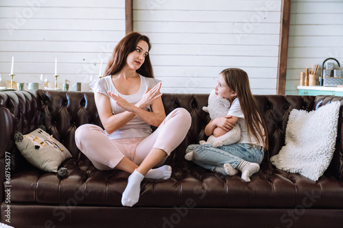 Woman imposing boundaries in non-permissive parenting style upbringing.
