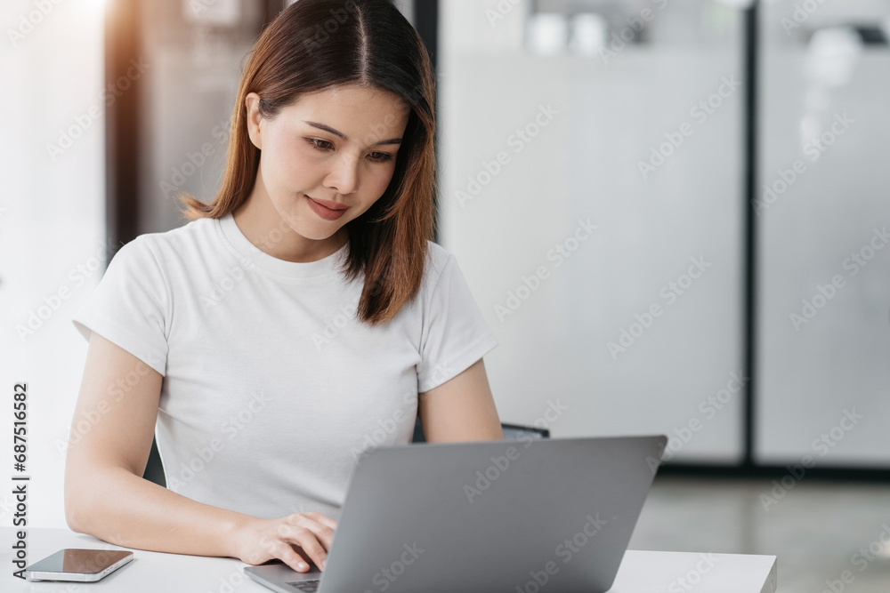 Email notification concept, Female use smartphone and laptop receive message alert in the mailbox. Email notification concept, Female use smartphone and laptop receive message alert in the mailbox.