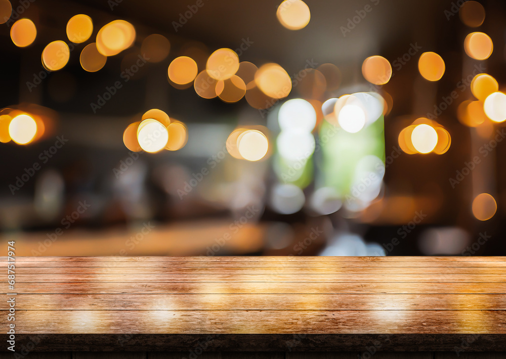 Empty wooden table top with lights bokeh on blur restaurant background. Empty wooden table top with lights bokeh on blur restaurant background.