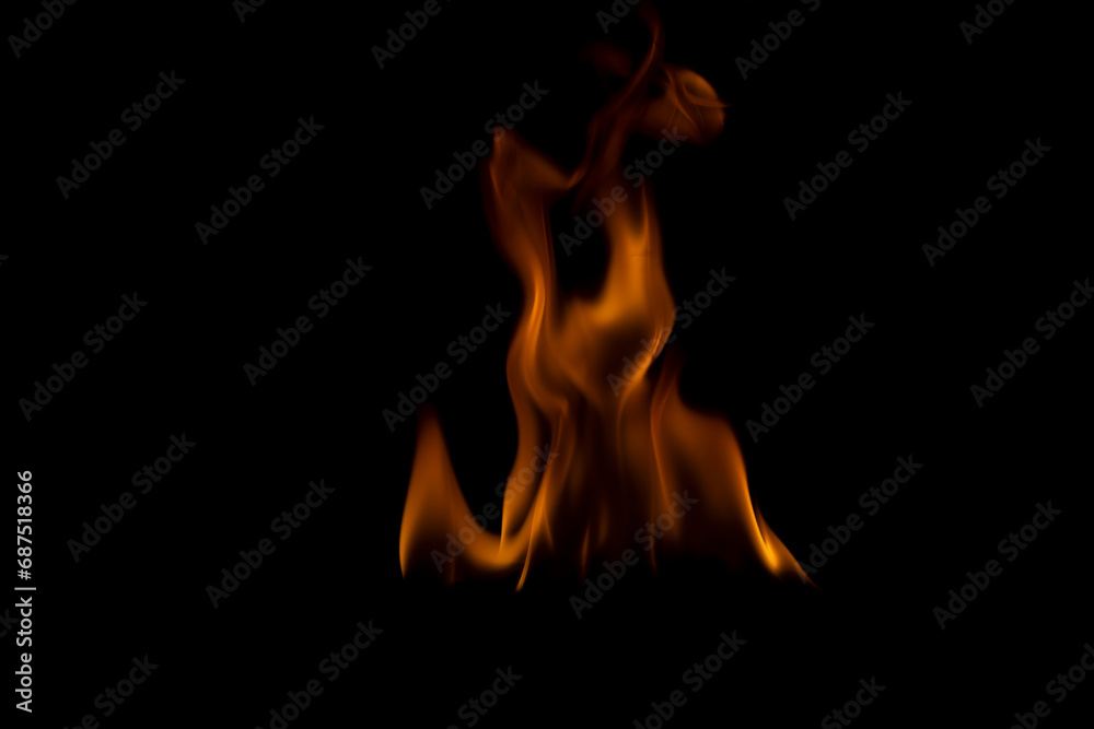 The fire flames is powerful , Shoot in a studio with a black background.	