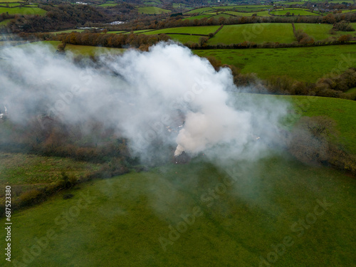 Fire in a field causing massive air pollution 