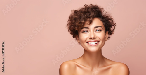 Portrait of young happy woman with rock short hairstyle. Skin care beauty, skincare cosmetics, dental concept, isolated over pink background. 