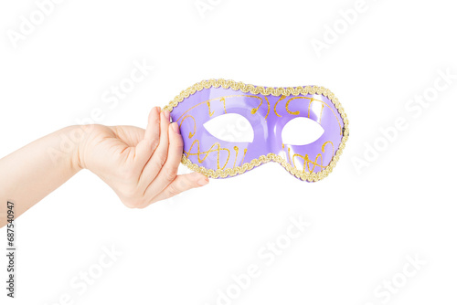 Carnival mask in hand, blue vintage masquerade accessory isolated