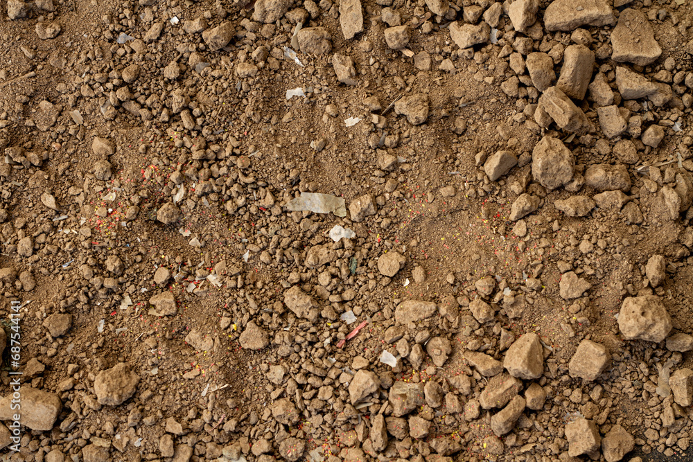 microplastic mixed or contaminated in soil, top view. microplastic mixed or contaminated in soil, top view.