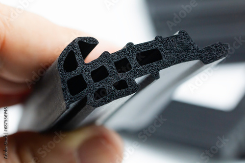 close-up shot of extruded rubber sponge profile (cellular rubber) photo
