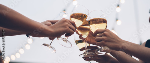 Background group of people celebrating and toasting glass of wine at the party together, Clubbing lifestyle, fun night activities concept