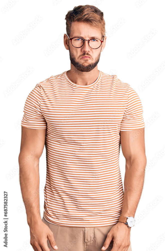 Young caucasian man wearing casual clothes and glasses depressed and worry for distress, crying angry and afraid. sad expression. Young caucasian man wearing casual clothes and glasses depressed and worry for distress, crying angry and afraid. sad expression.