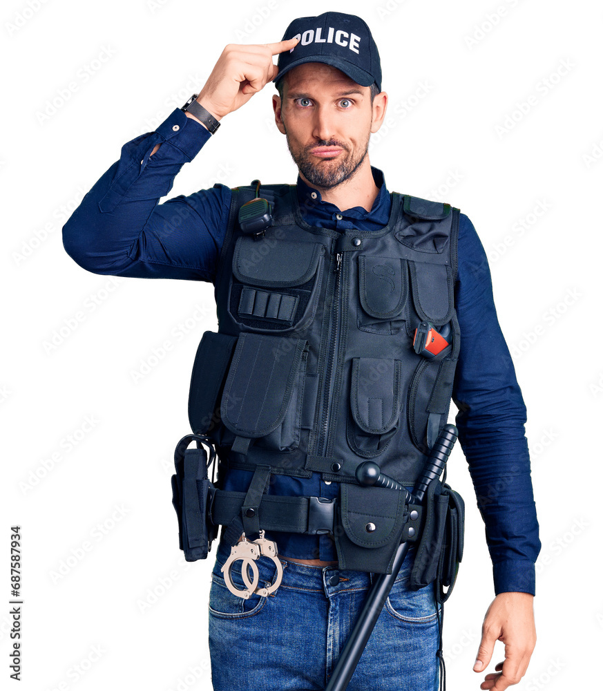 Young handsome man wearing police uniform worried and stressed about a problem with hand on forehead, nervous and anxious for crisis Young handsome man wearing police uniform worried and stressed about a problem with hand on forehead, nervous and anxious for crisis