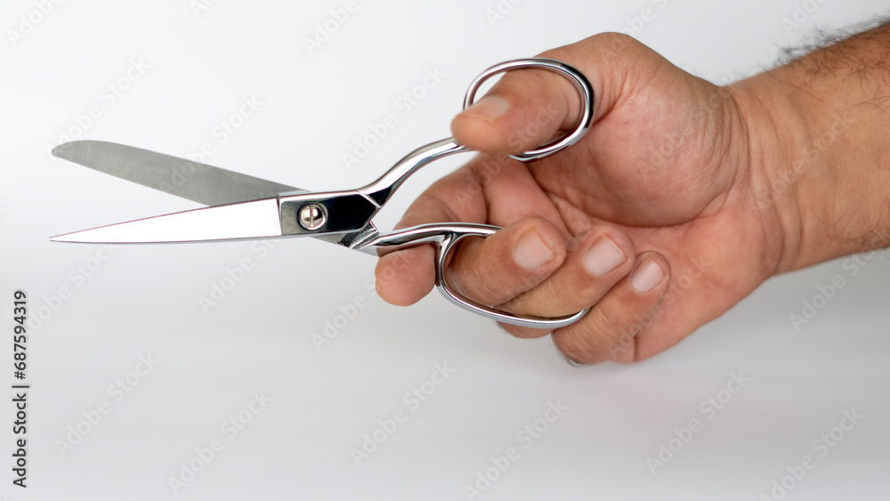 tailor hand part holding scissor 
