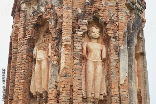 The unique and historic Wat Chama Thewi in Lamphun, Thailand photo