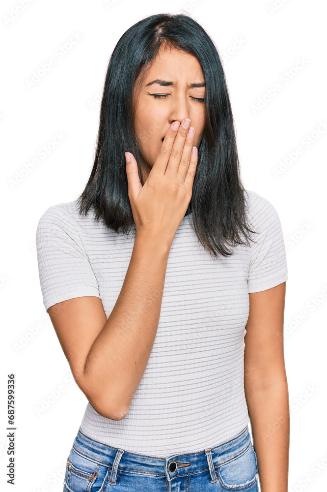 Beautiful asian young woman wearing casual white t shirt bored yawning tired covering mouth with hand. restless and sleepiness. Beautiful asian young woman wearing casual white t shirt bored yawning tired covering mouth with hand. restless and sleepiness.
