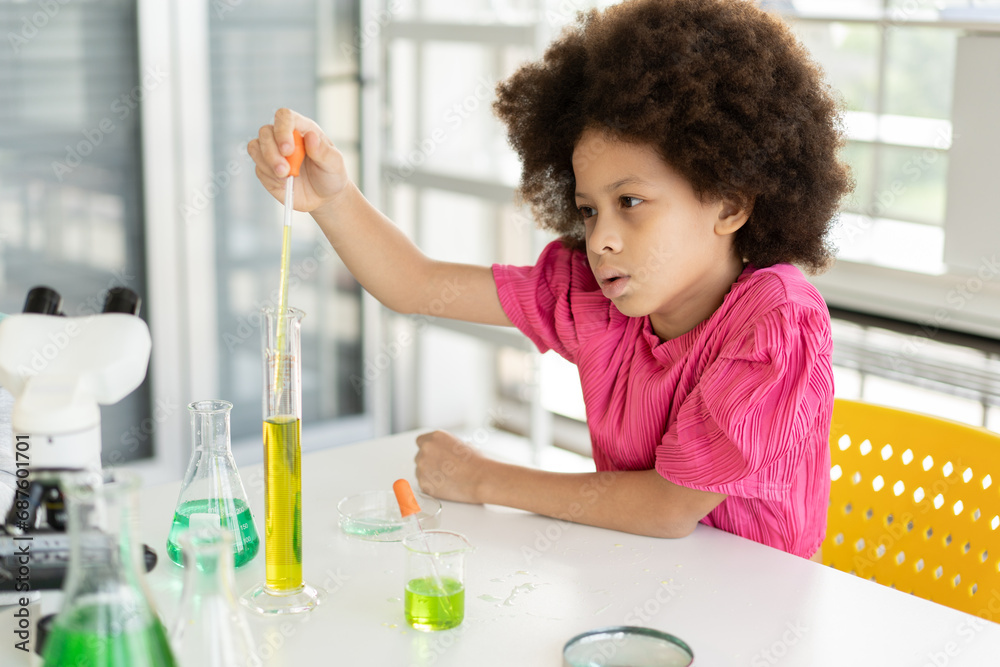 Mix race kid girl funny learning study science of test chemical at learning class Mix race kid girl funny learning study science of test chemical at learning class