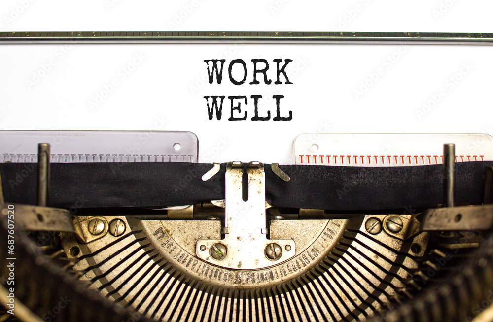 Work well symbol. Concept words Work well typed on beautiful old retro typewriter. Beautiful white paper background. Business marketing, motivational work well concept. Copy space.