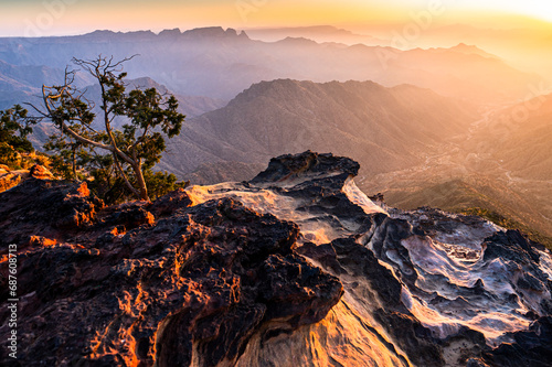 Colorful landscape background at sunrise in the Asir Mountains in Saudi Arabia.