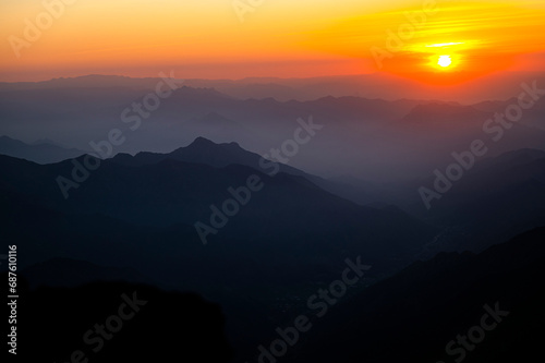 Colorful landscape background at sunrise in the Asir Mountains in Saudi Arabia.