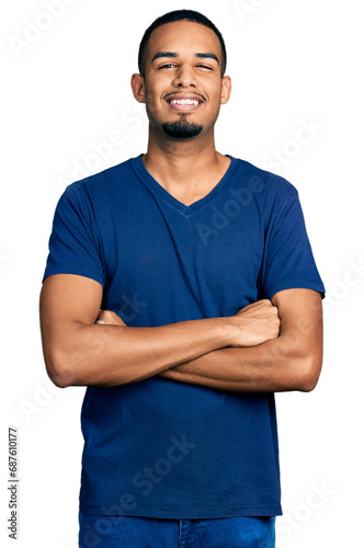 Young african american man with arms crossed gesture smiling with a happy and cool smile on face. showing teeth.