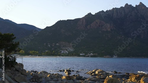 Beach of Foxi Manna in a mountain landscape in Sardinia, Italy photo