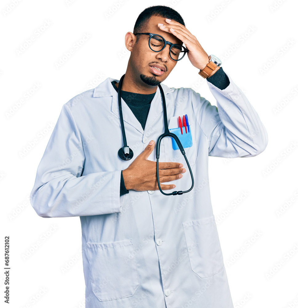 Young african american man wearing doctor uniform and stethoscope touching forehead for illness and fever, flu and cold, virus sick Young african american man wearing doctor uniform and stethoscope touching forehead for illness and fever, flu and cold, virus sick