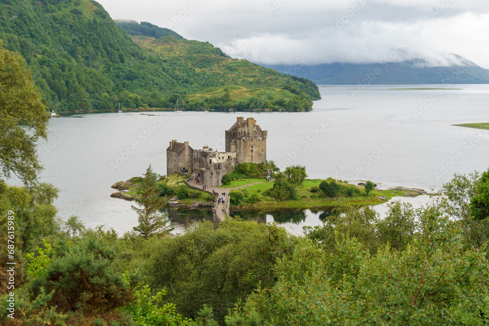 View through the woods to Eilean Donan Castle and island