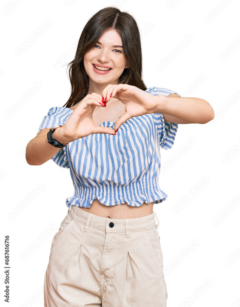 Young beautiful caucasian girl wearing casual clothes smiling in love doing heart symbol shape with hands. romantic concept. Young beautiful caucasian girl wearing casual clothes smiling in love doing heart symbol shape with hands. romantic concept.