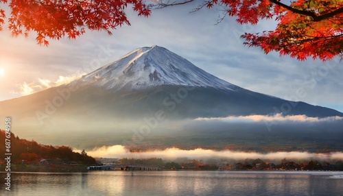colorful autumn season and mountain fuji with morning fog and red leaves at lake kawaguchiko is one of the best places in japan photo