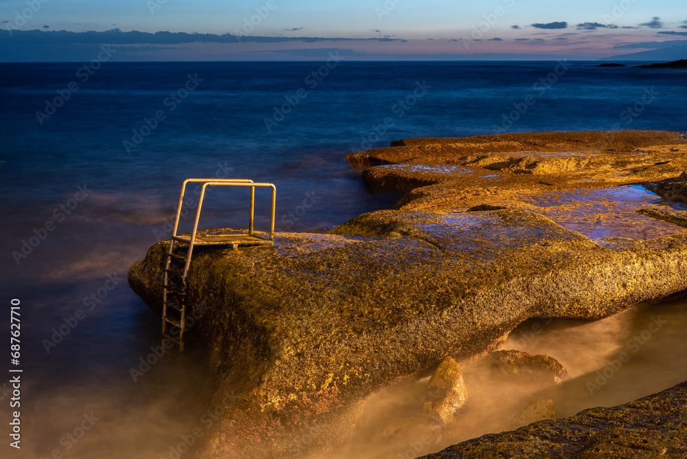 Stairs in La Caleta beach at night, Tenerife Island, Spain