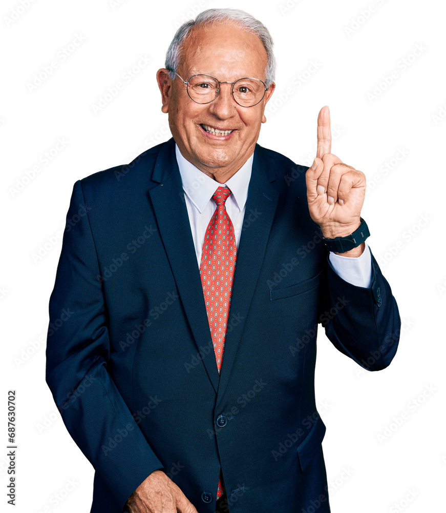 Senior man with grey hair wearing business suit and glasses pointing finger up with successful idea. exited and happy. number one. Senior man with grey hair wearing business suit and glasses pointing finger up with successful idea. exited and happy. number one.