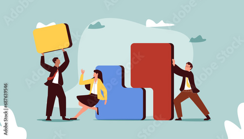People organize abstract geometric shapes scattered around them. Young men and women collecting figures organise them
