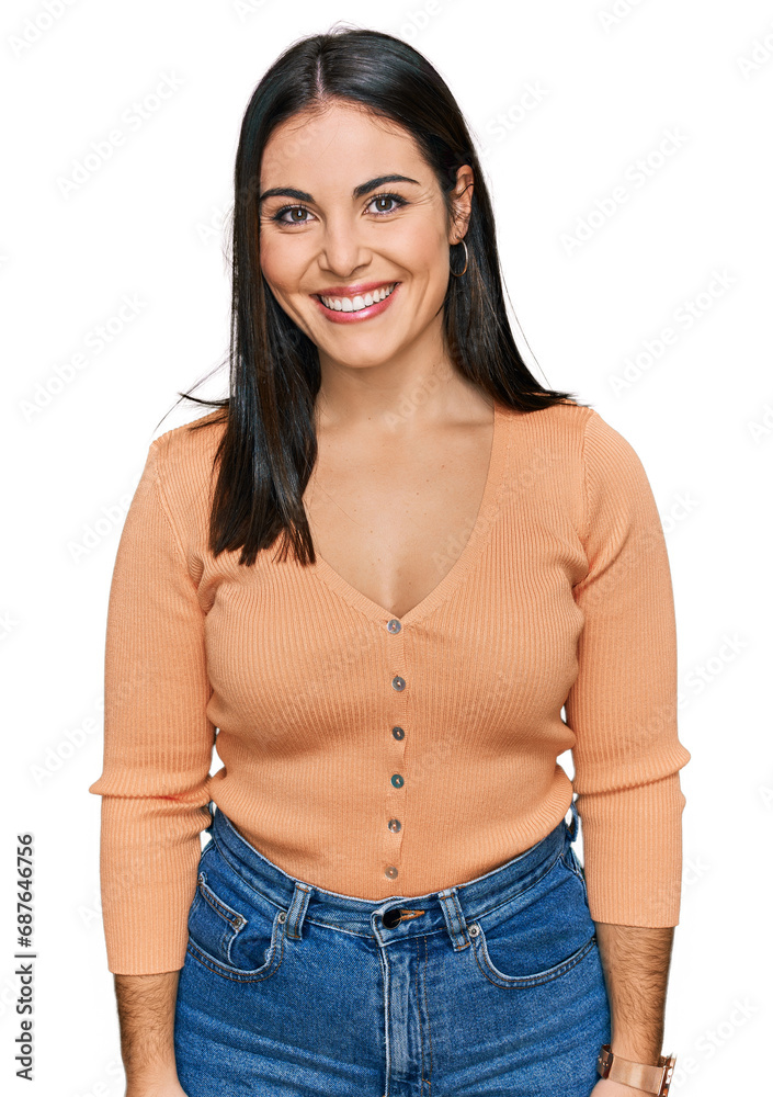 Young hispanic woman wearing casual clothes with a happy and cool smile on face. lucky person. Young hispanic woman wearing casual clothes with a happy and cool smile on face. lucky person.