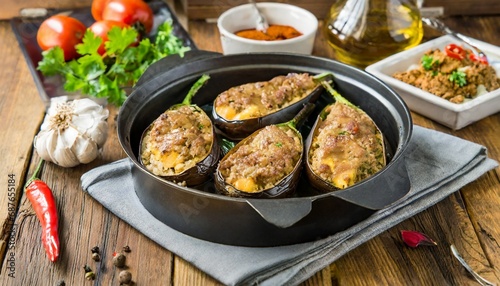 Turkish Gastronomy - Karniyarik - Eggplant Stuffed with a Mix of Minced Meat, Onions, Garlic and Black Pepper