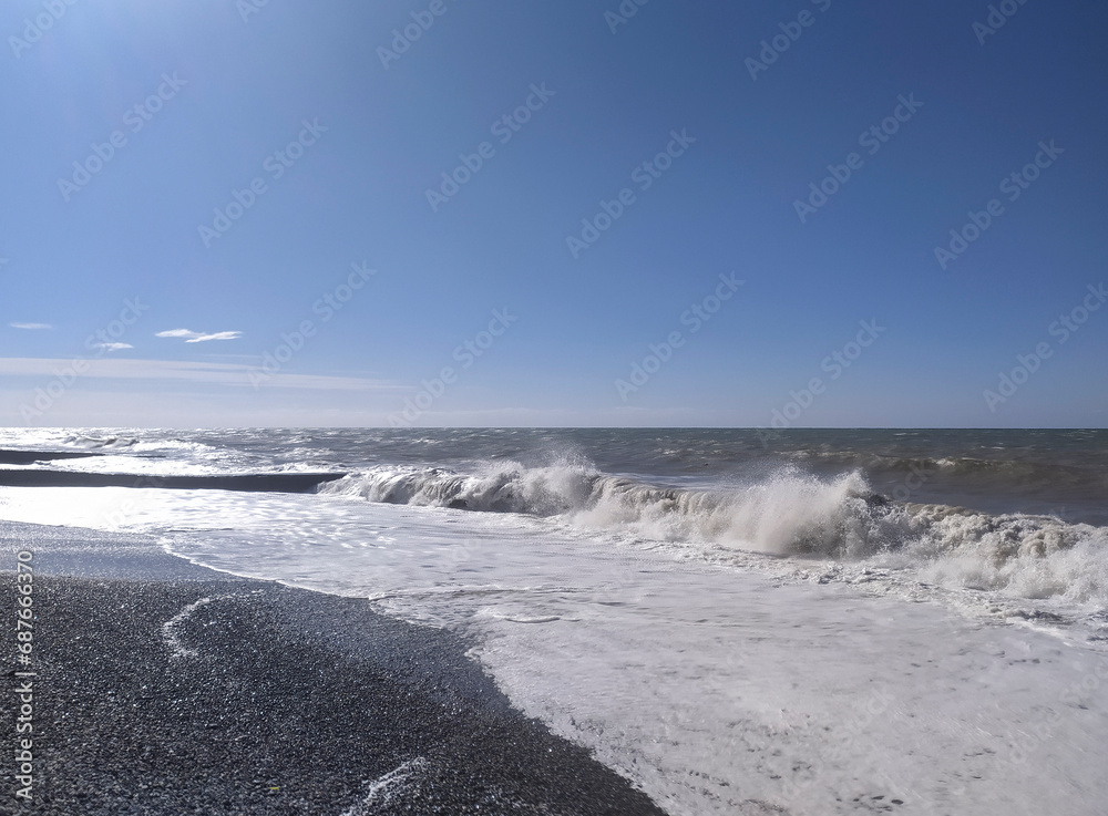 waves breaking on the beach in Sochi
