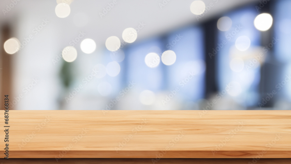 Empty wooden table over blurred coffee shop or office background, product display montage Empty wooden table over blurred coffee shop or office background, product display montage